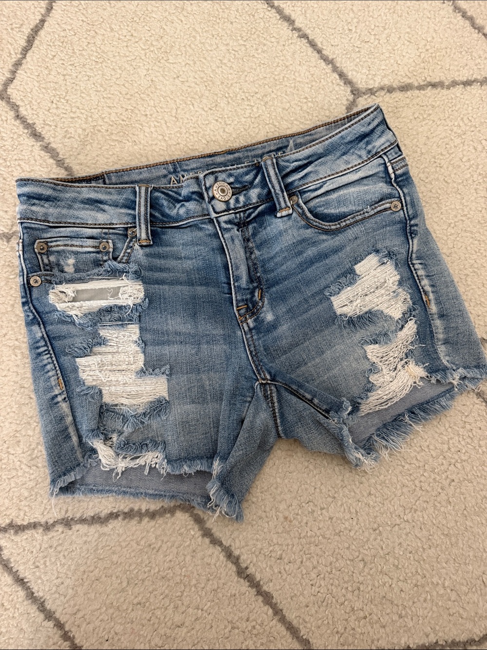 American Eagle Outfitters Next Level Stretch MIDI Light Blue Ripped Denim Shorts
